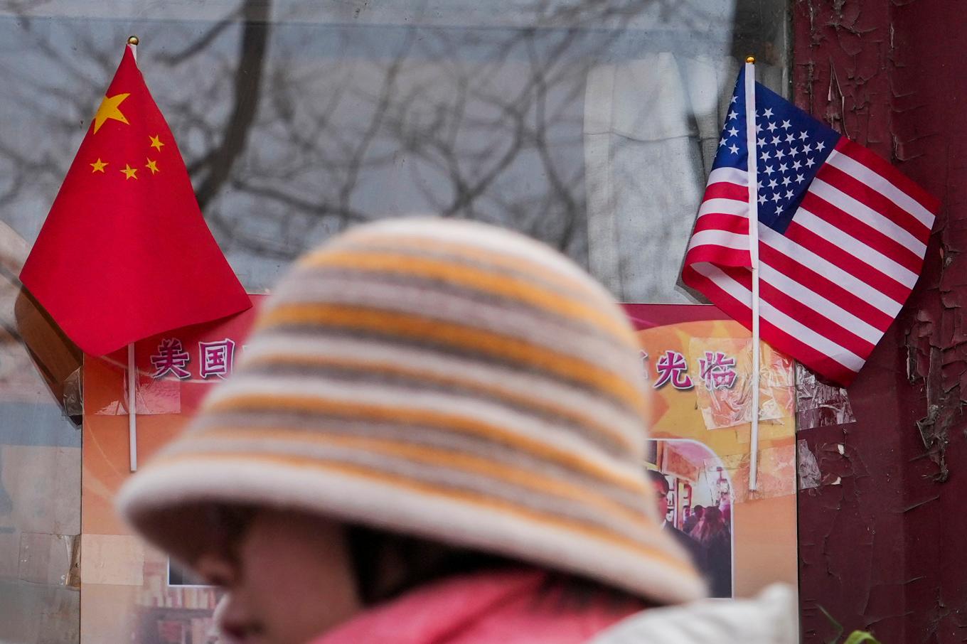 Kina anses vara det största hotet mot amerikanska intressen globalt, enligt en ny underrättelserapport. Foto: Andy Wong/AP/TT