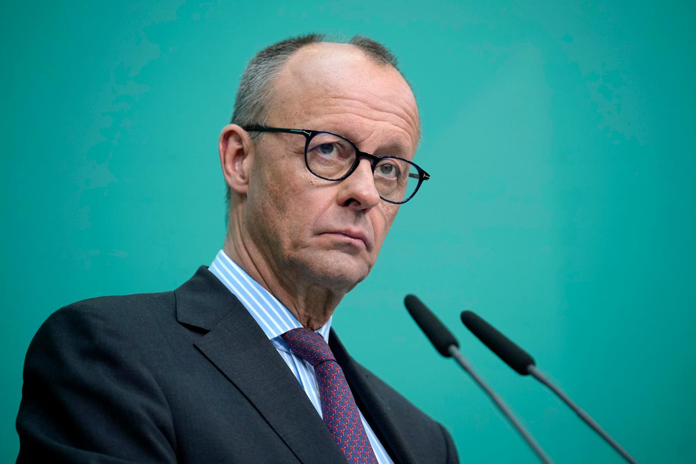 Friedrich Merz planer hänger löst. Ebrahim Noroozi/AP/TT