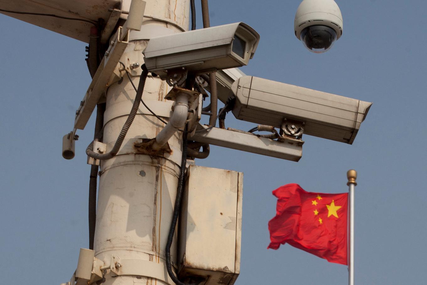 Kinas kommunistparti tar till allt kraftfullare metoder för att massövervaka förföljda Falun Gong-utövare. Foto: Ed Jones/AFP via Gett Images