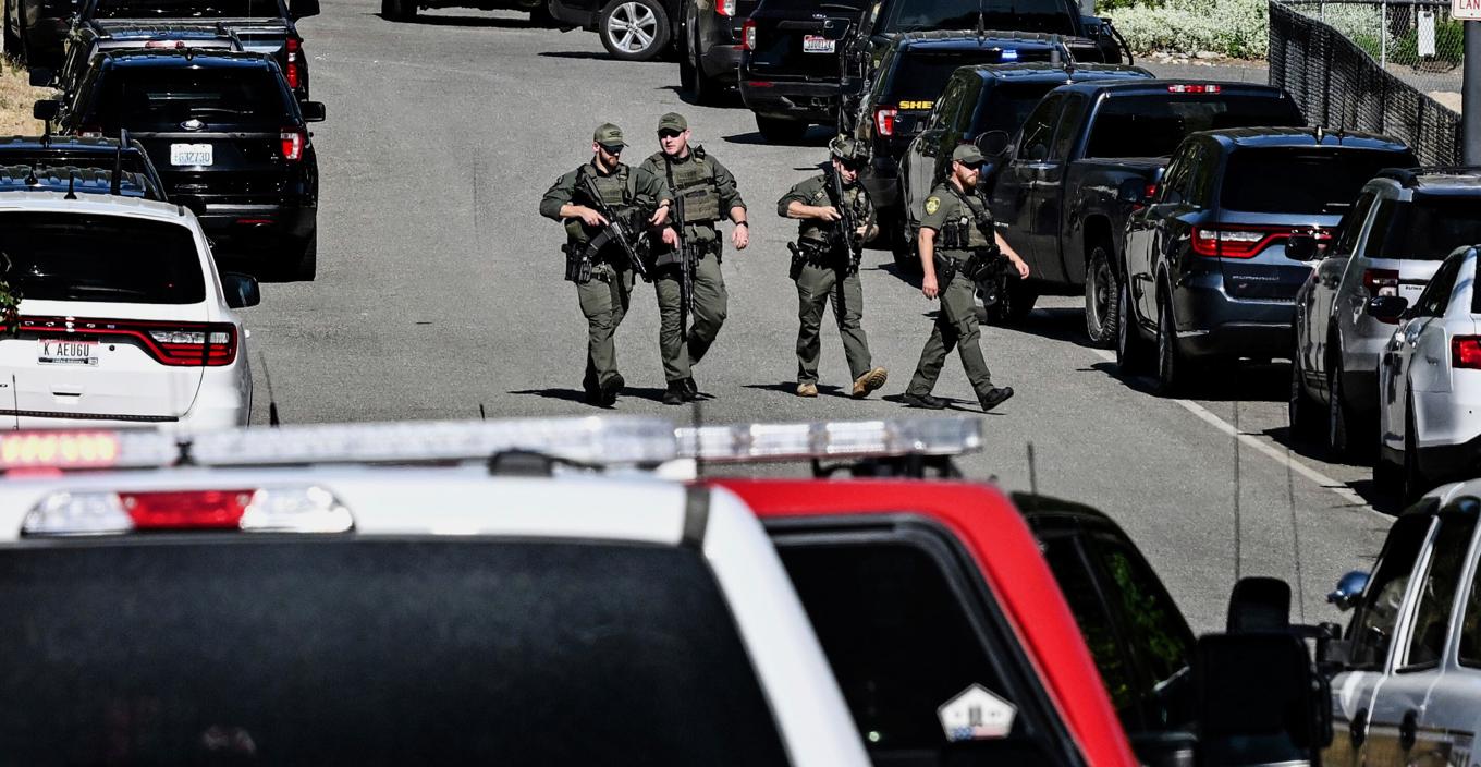 Polis vid Canfield Mountain i Idaho där en dödsskjutning ägt rum. Foto: Kathy Plonka/AP/TT
