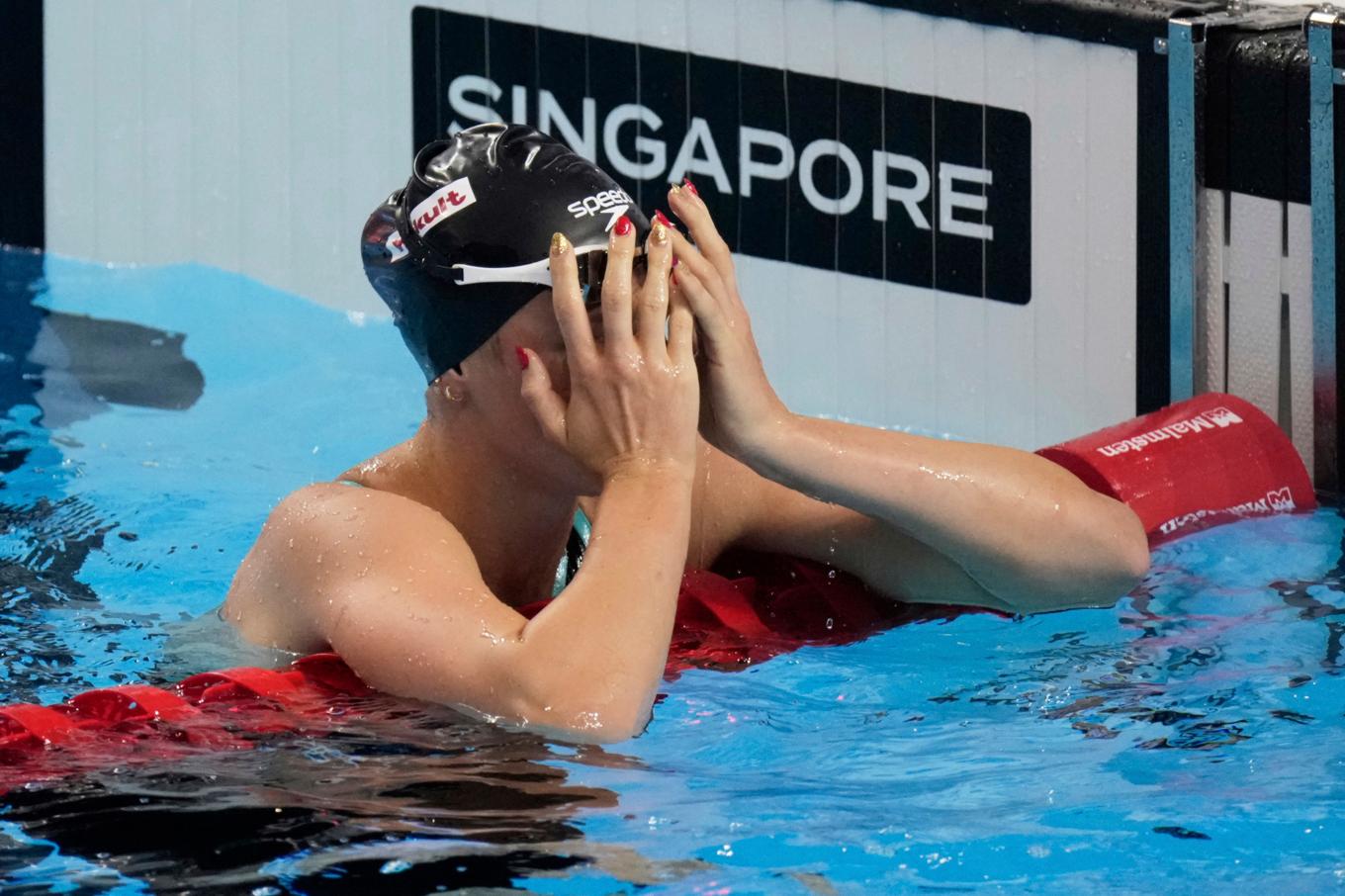 Summer McIntosh reagerar efter att ha missat världsrekordet med liten marginal. Foto: Lee Jin-Man/AP/TT