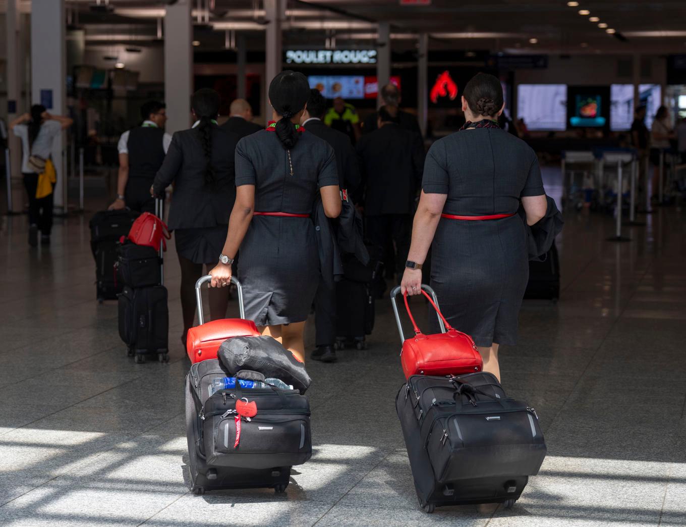 Anställda på Air Canada. Arkivbild. Foto: Christinne Muschi/AP