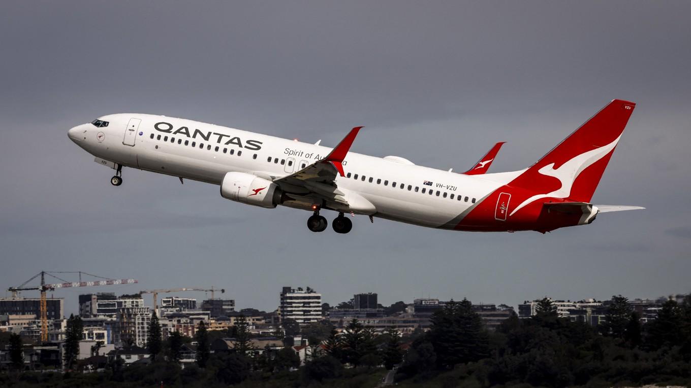 Det australiska flygbolaget Qantas ska betala 559 miljoner kronor i böter efter att ha avskedat 1 800 anställda under pandemin. Foto: David Gray/AFP via Getty Images