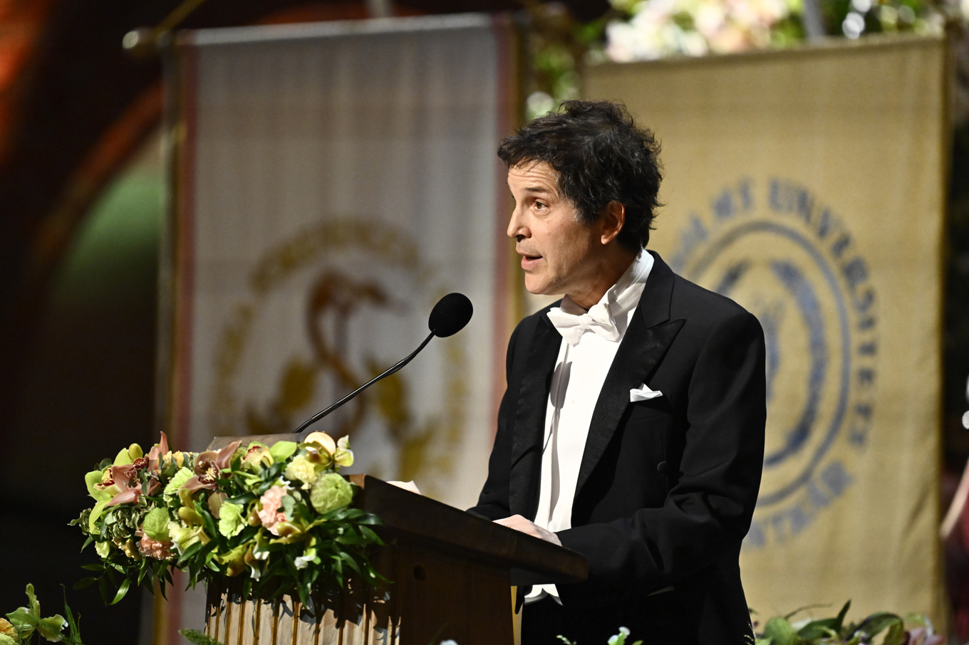 En av fjolårets Nobelprisvinnare i kemi, David Baker. Bilden togs när han höll sitt tal under Nobelbanketten i Stadshuset i Stockholm. Foto: Christine Olsson/TT