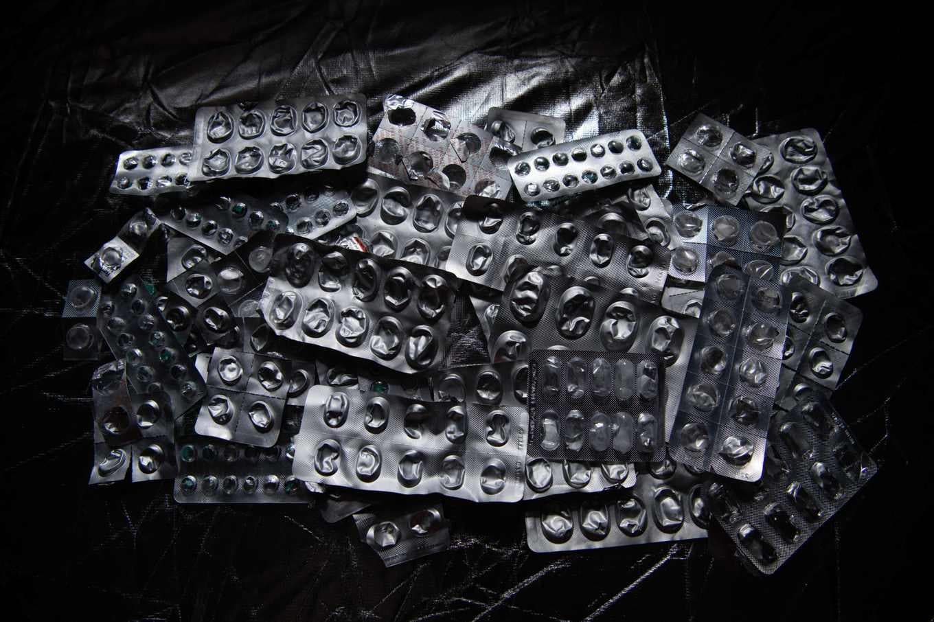 Använda medicinförpackningar. Foto: Olivier Morin/AFP.