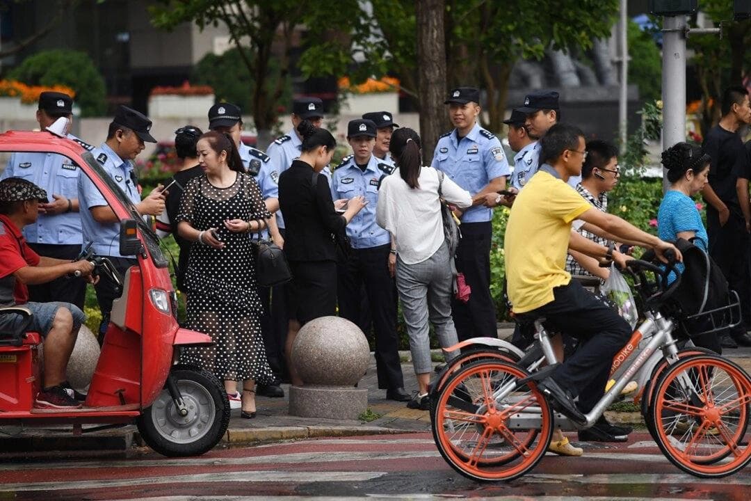 Poliskontroll i Peking. Foto: Greg Baker/AFP via Getty Images