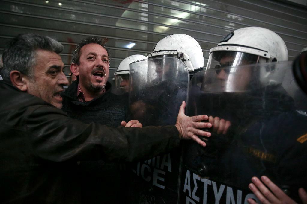 
Grekiska statsbudgeten har finansierats med nödlån sedan 2010 och långivarnas krav på ytterligare skatte- och pensionsreformer har mötts av protester, emellanåt med våldsamma inslag. Foto: Yorgos Karahalis AP/TT-arkivbild                                            
