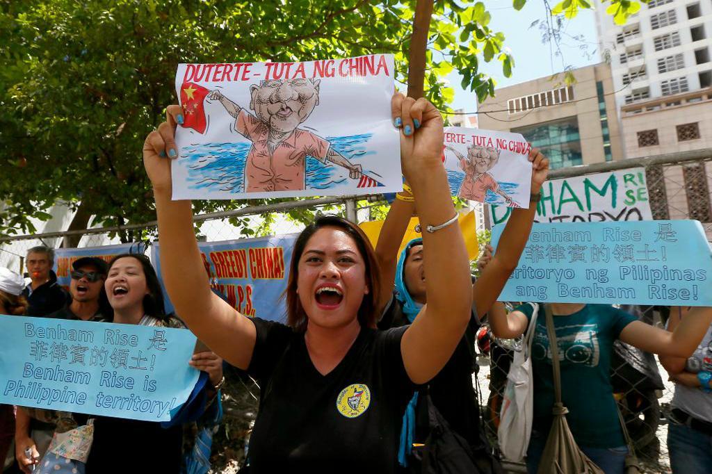 
Protester mot Kinas militarisering av Sydkinesiska havet. Foto: Bullit Marquez AP/TT                                            