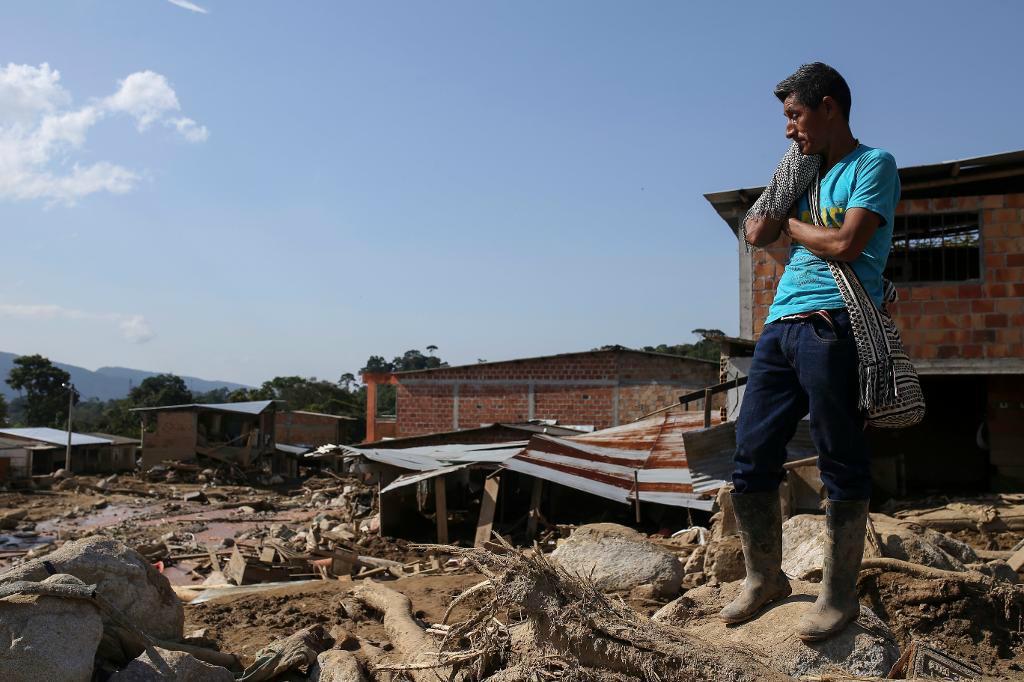 

Minst 314 människor omkom i det jordskred som drabbade Colombia. Foto: Ivan Valencia/AP/TT                                                                                        