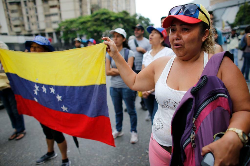 
Protester mot president Nicolas Maduro i Caracas.  Foto: Ariana Cubillos/AP/TT                                            