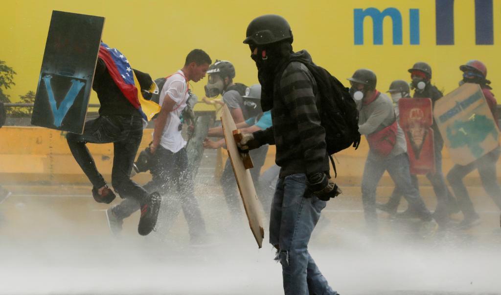 Demonstranter i Venezuelas huvudstad Caracas. Foto: Fernando Llano/AP/TT