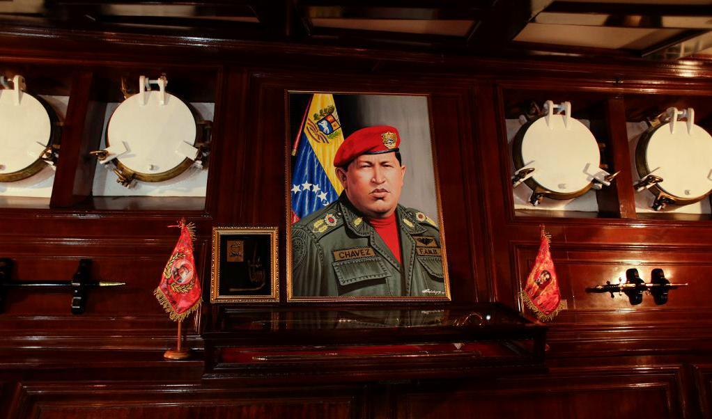 En målning av Venezuelas dåvarande president Hugo Chávez, som avled i cancer 2013. Arkivbild. Foto:
Arnulfo Franco/AP/TT