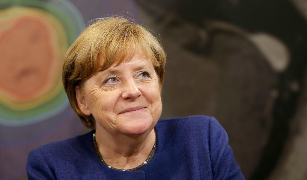 Britter som bor i EU behöver inte vara oroliga för att bli hemskickade efter Brexit, säger Tysklands förbundskansler Angela Merkel. Foto: Michaela Rehle/AP/TT