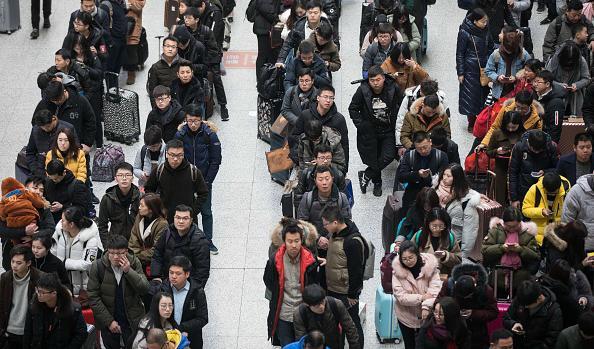 

Resenärer på Hangzhous tågstation i Kina, februari 2018. Foto: AFP/Getty Images                                                                                        