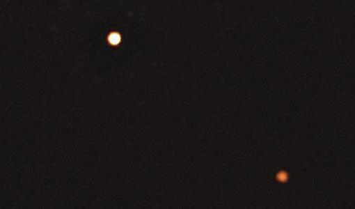 Astronomer har för första gången fångat två planeter runt en avlägsen stjärna på bild. Foto: ESO/TT