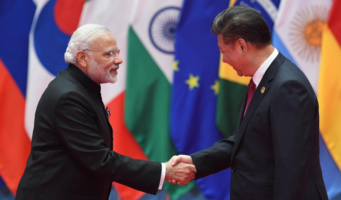 Indiens premiärminister Narendra Modi skakar hand med Kinas ledare Xi Jinping vid ett G20-möte i Hangzhou i Kina, den 4 september 2016. Foto: Greg Baker/AFP/Getty Images