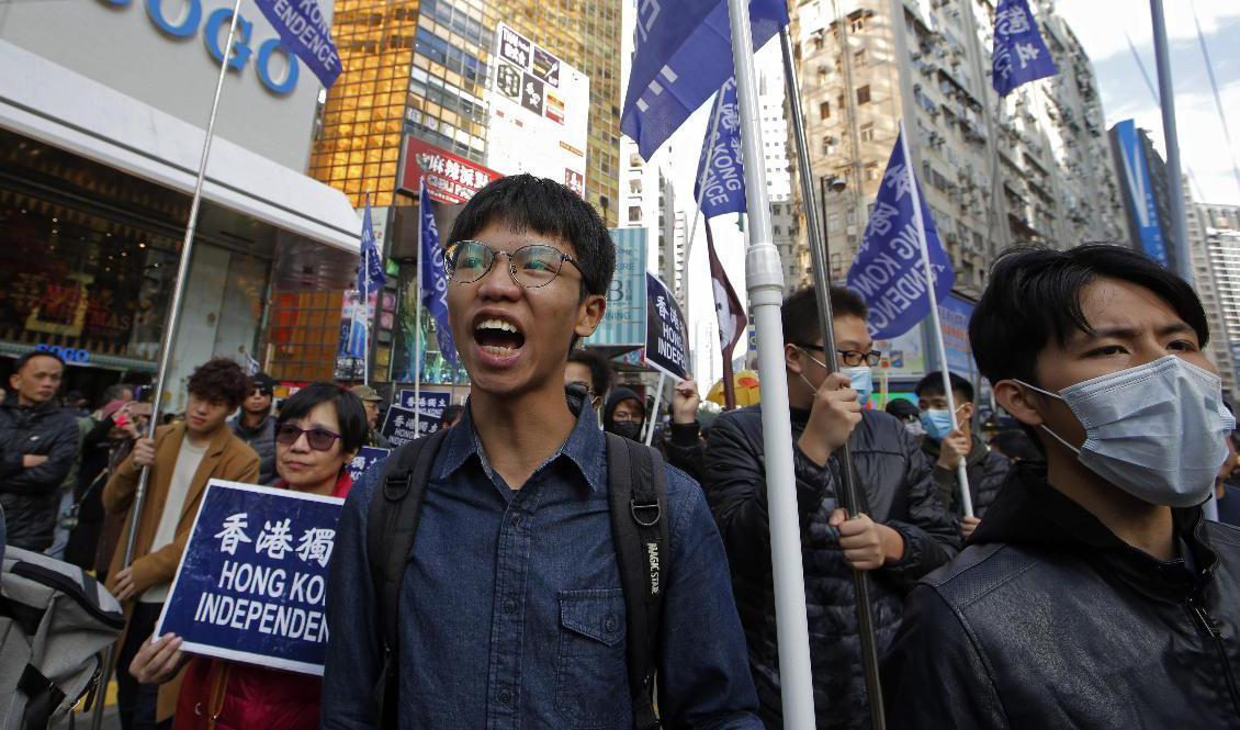 Demokratiaktivisten Tony Chung, fotograferad 2019 under en protest i Hongkong. Foto: Kin Cheung/AP/TT