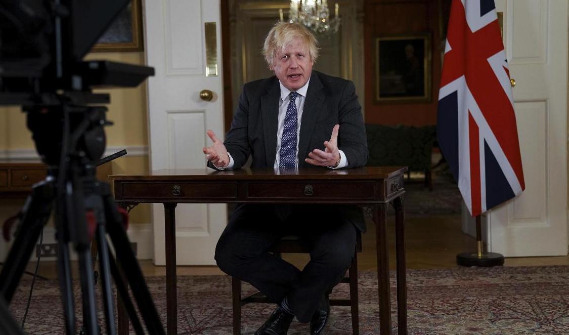 Storbritanniens Boris Johnson håller tal till nationen om coronapandemin. Foto: Kirsty O'Connor/AP/TT