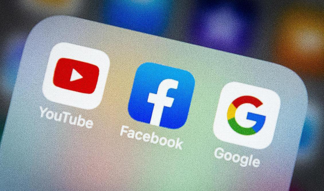 Appar på mobiltelefon: YouTube, Facebook och Google. Foto: Helena Landstedt/TT