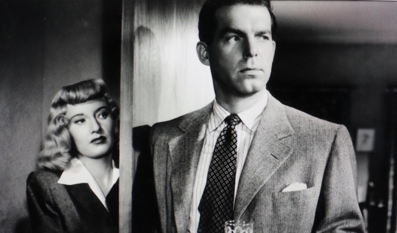 Phyllis Dietrichson (Barbara Stanwyck), Walter Neff (Fred MacMurray) som de två mördarna i Kvinna utan samvete.