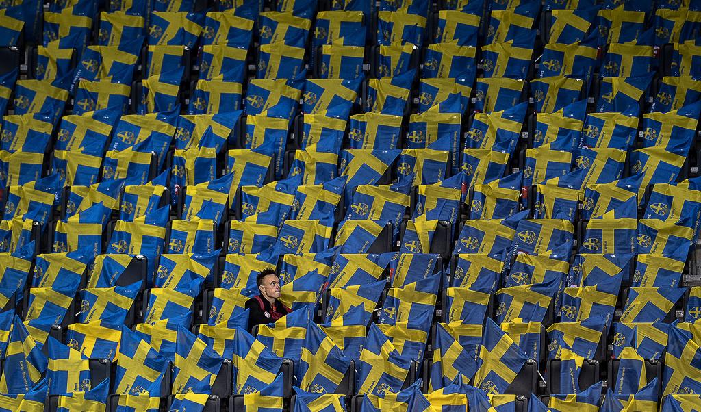 Sverige klätt i blågula färger dagen efter terrordådet i Bryssel hade varit en styrkedemonstration. Foto: Jonas Ekströmer/TT