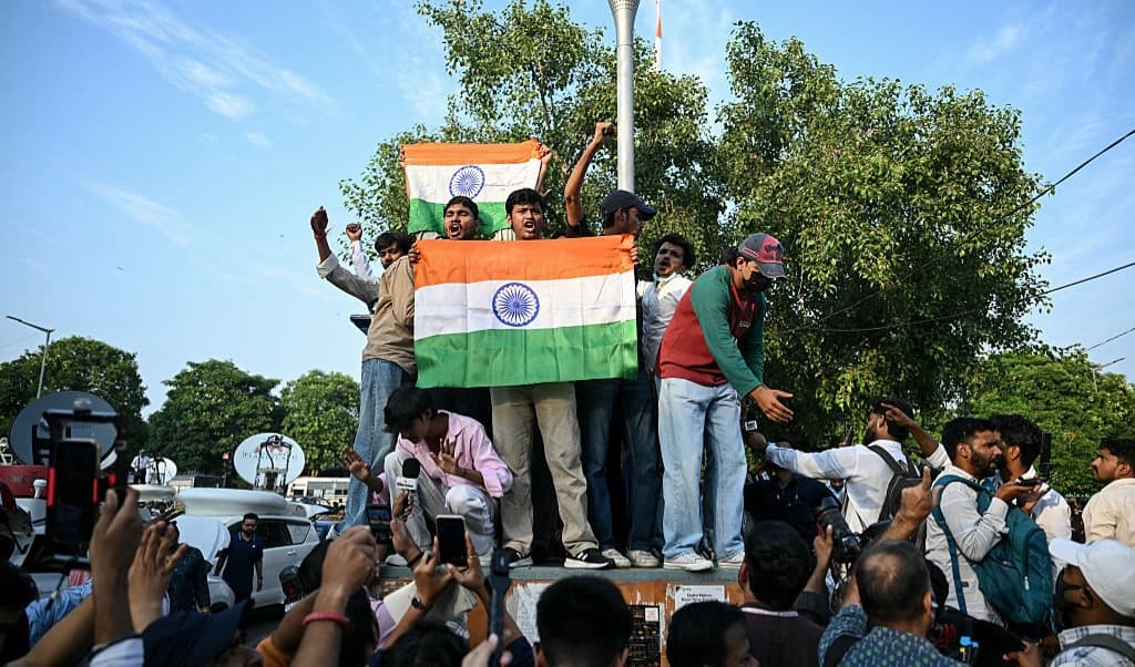 CJP-anhängare kräver valchefen Gyanesh Kumars avgång i New Delhi den 16 oktober 2026 efter anklagelser om fel i röstlängderna. Foto: Arun Sankar/AFP via Getty Images.