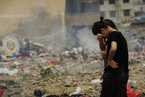 Den 12 maj, 2009 var det ett år sedan jordbävningskatastrofen i Sichuan, Kina. (Foto: AFP / Peter Parks)
