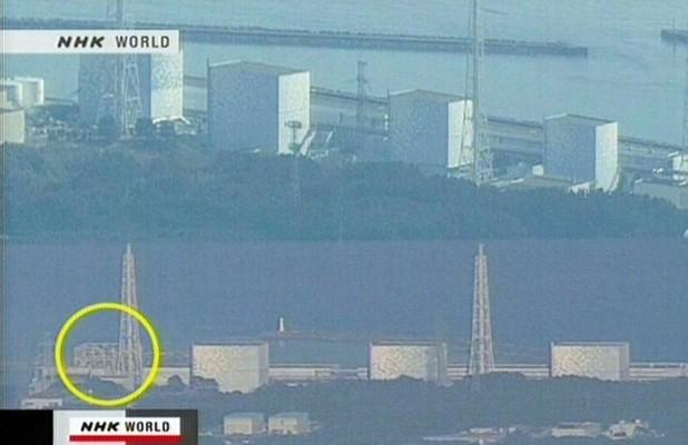 Rök och ånga kommer från atomanläggningen Fukushima 1, efter en explosion på lördagsmorgonen som förstörde väggar och tak på kärnkraftsanläggningen 25 mil nordost om Tokyo. (Foto: AFP/Ho/Nhk)