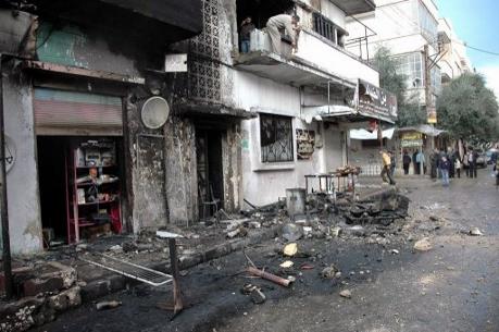 Det meningslösa våldet florerar I Syrien. Bilden är från Homs den 9 januari. (Foto: Ho / Sana / AFP) 
