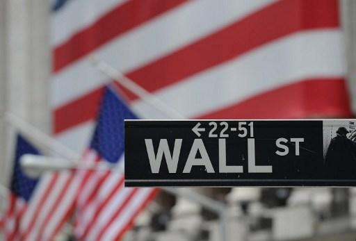 Wall Street-skylt fotograferad den 16 september 2008. Den veckan hade aktiemarknaden sjunkit med svindlande fart och investmentbanken Lehman Brothers kollapsade vilket utlöste rädsla för att det fanns fler dåliga nyheter inom finanssektorn och ekonomin. (Foto: Stan Honda / AFO)