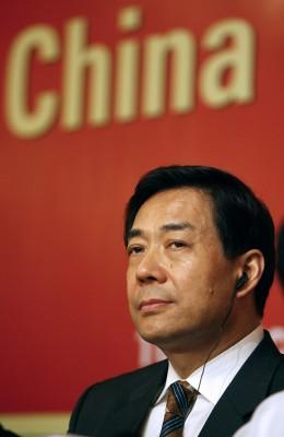 Kinas handelsminister Bo Xilai är polisanmäld i nio länder för brott i förföljelsen av Falun Gong. Senast i Finland. (Foto: AFP/Prakash SINGH)