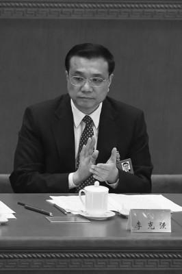 Li Keqiang deltar vid öppnandet av det kinesiska kommunistpartiets 18:e kongress, den 8 november. Li är den som antas utses till Kinas näste premiärminister i slutet av veckan. (Lintao Zhang/Getty Images)