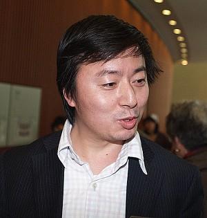 Yang Xi, internationell handelsman vid Chinese Spectacular i Osaka, Japan den 20 februari.
