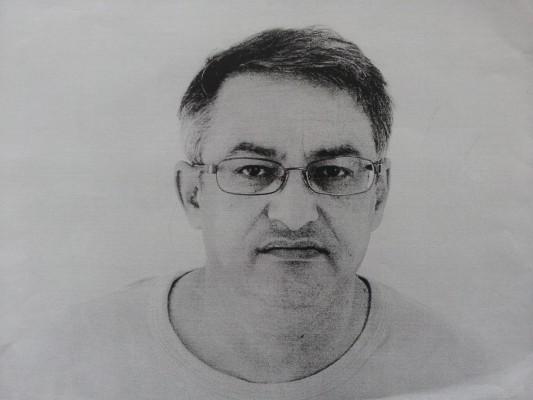 George Karimi, 2009, bilden är utsmugglad från Beijing prison no.2. En polis tog bilden i utbyte mot en dyrbar penna.  
