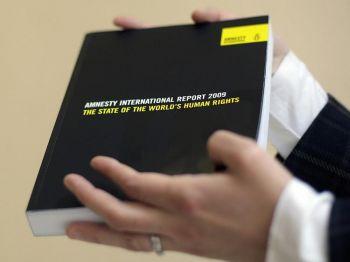 Amnesty International framlägger i sin rapport för 2009 att Kinas regim förvärrade människorättssituationen runt tiden för OS. (Foto: Shaun Curry/AFP/Getty Images)