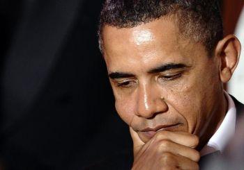USA:s president Obama lyssnar när Hu Jintao talar i Vita huset den 19 januari. När Hu kommenterade mänskliga rättigheter i Kina gjorde han för en kinesisk ledare den ovanliga kommentaren att "mycket" återstår att göra, men betonade att han inte delade Obamas uppfattning att grundläggande mänskliga rättigheter var "universella." (Foto: Mandel Ngan / Getty Images) 