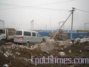 Pekings sista "vädjarby" förstördes den 17 december. (Foto: Epoch Times)