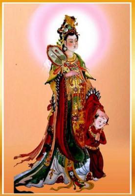 Bodhisattva Avalokitesvara, även kallad Bodhisattva Guanyin, barmhärtighetens gudinna, avbildad tillsammans med en liten tjänare. (Bild: zhengjian.org)