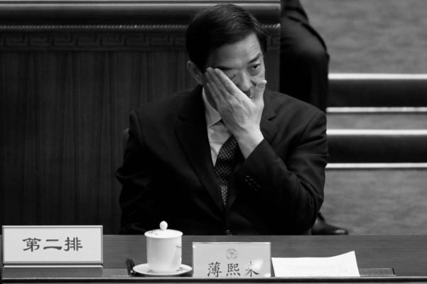 Chongqings partisekreterare Bo Xilai vid det kinesiska folkets politiskt rådgivande konferens i Folkets stora sal den 13 mars 2012 i Peking. Bos fall började strax efter denna bild togs, och nu väntar åtal för anklagelser om korruption. (Lintao Zhang/Getty Images)