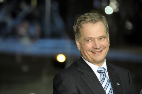 En leende nyvald finländsk president, Sauli Niinistö. (Foto: Martti Kainulainen / AFP)