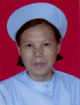 He Xianggu är en sjuksköterska från staden Changsha i Kina. (Foto: Minghui.org). 