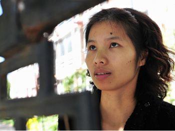 Den kinesiska dissidenten Zeng Jinyan i inofficiell husarrest i Bobo Freedom Village. (Foto: Frederic J Brown/Getty Images)