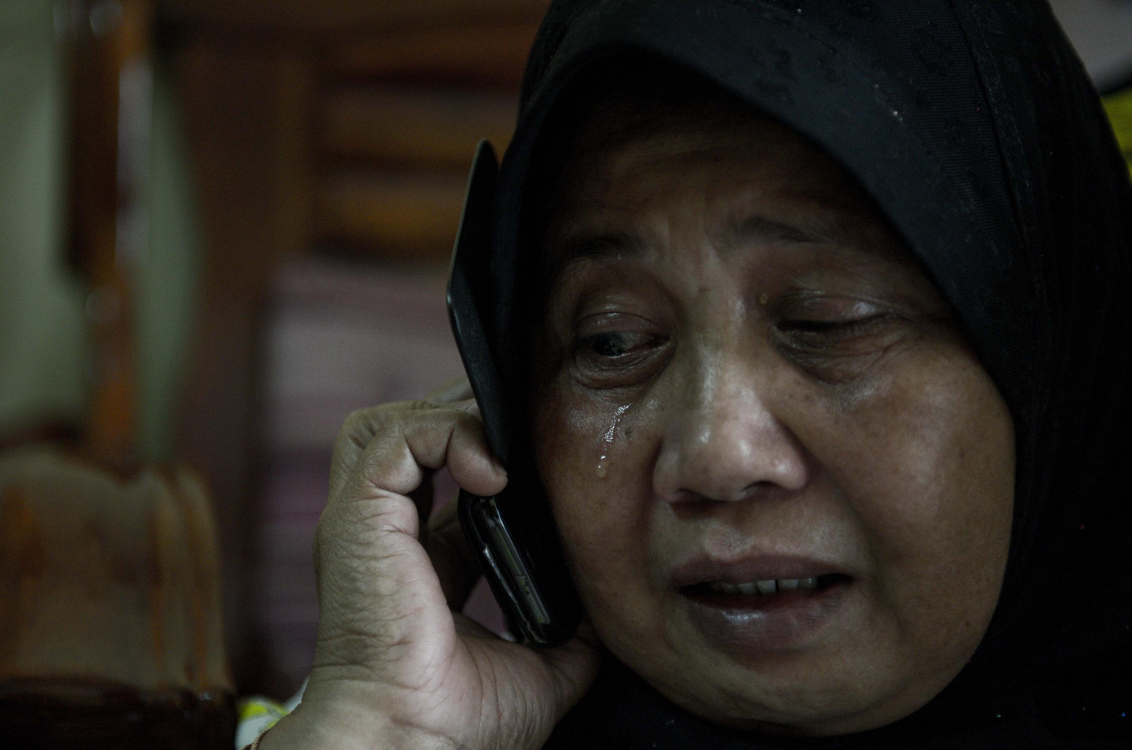 Personer som är oroliga för att anhöriga dras in i extremism ska få ett nödnummer att ringa. (Foto: Mohd Rasfan /AFP/Getty Images)