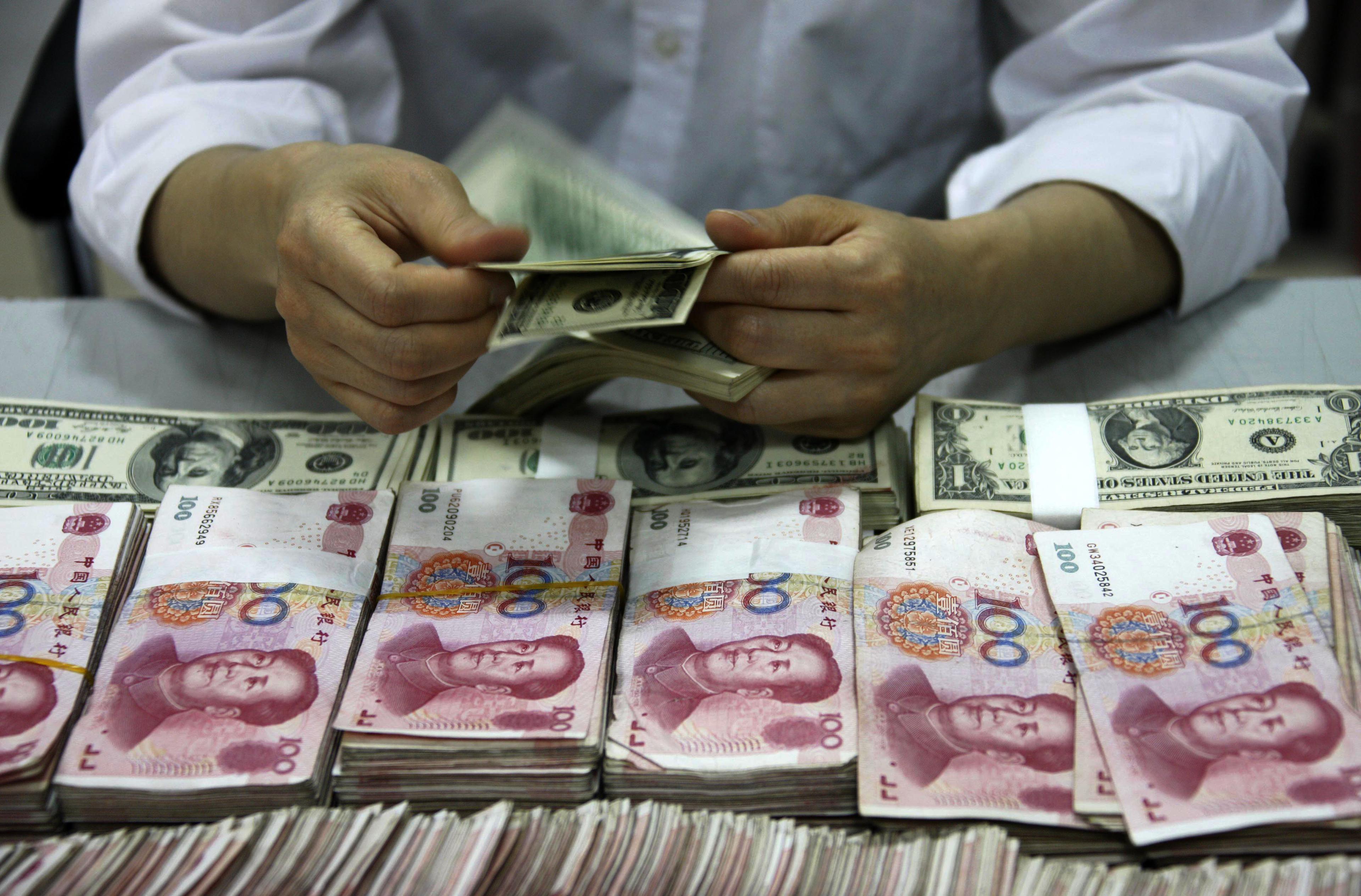 Kinas illegala banksystem omsätter hundratals miljarder. Nu har det största nätverket hittills avslöjats, enligt statliga medier. (STR/AFP/Getty Images)