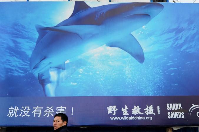 En reklampelare i Shanghai.
(Foto: Frederic J. Brown/AFP/Getty Images)