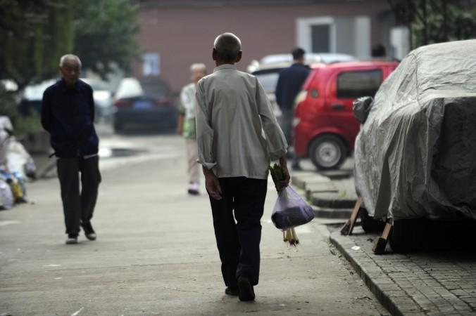 I dagens Kina vågar ingen hjälpa äldre som ramlar på gatan av rädsla för att bli anklagade för att ha orsakat fallet. (Foto: Wang Zhao/AFP/Getty Image)