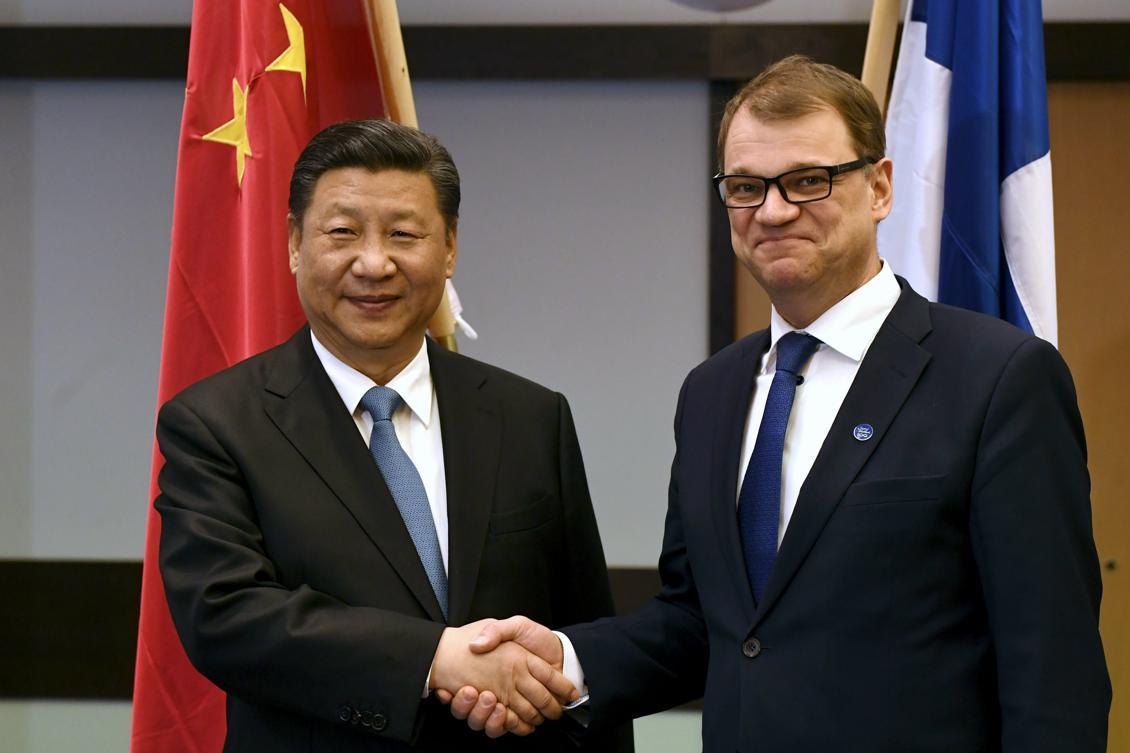 Kinas president Xi Jinping och Finlands president Sauli Niinistö. Foto: Vesa Moilanen/AFP/Getty Images