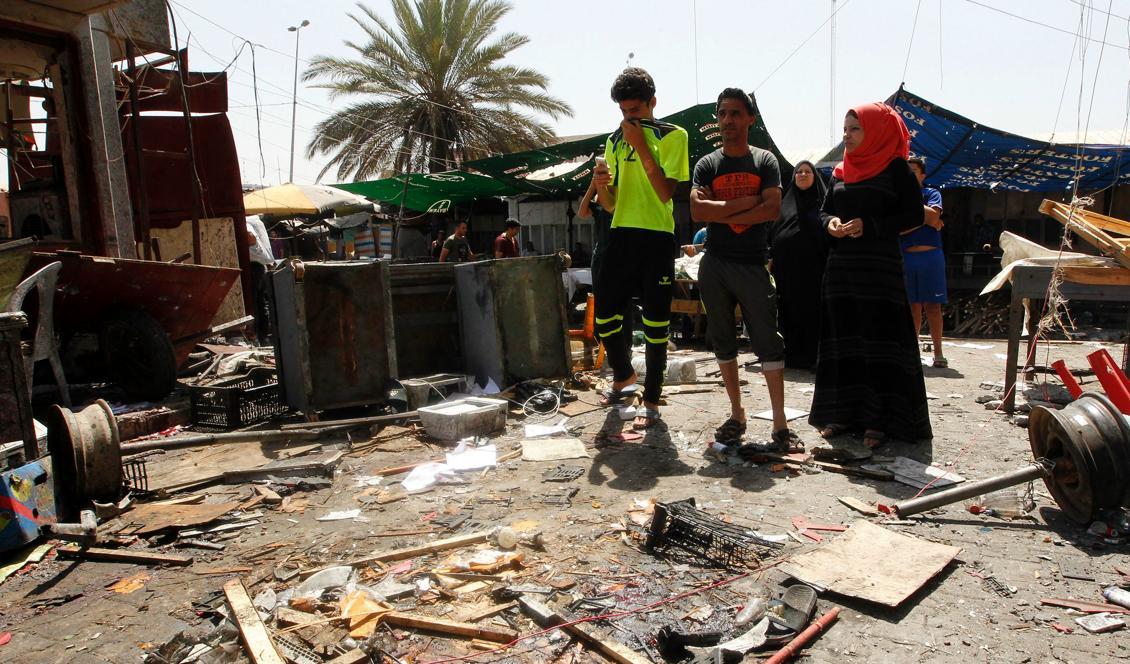 
Dagens andra bilbomb i Bagdad exploderade vid Al-Shuhada-bron. Även här dog och skadades många. Foto: Sabah Arar/AFP/Getty Images                                            
