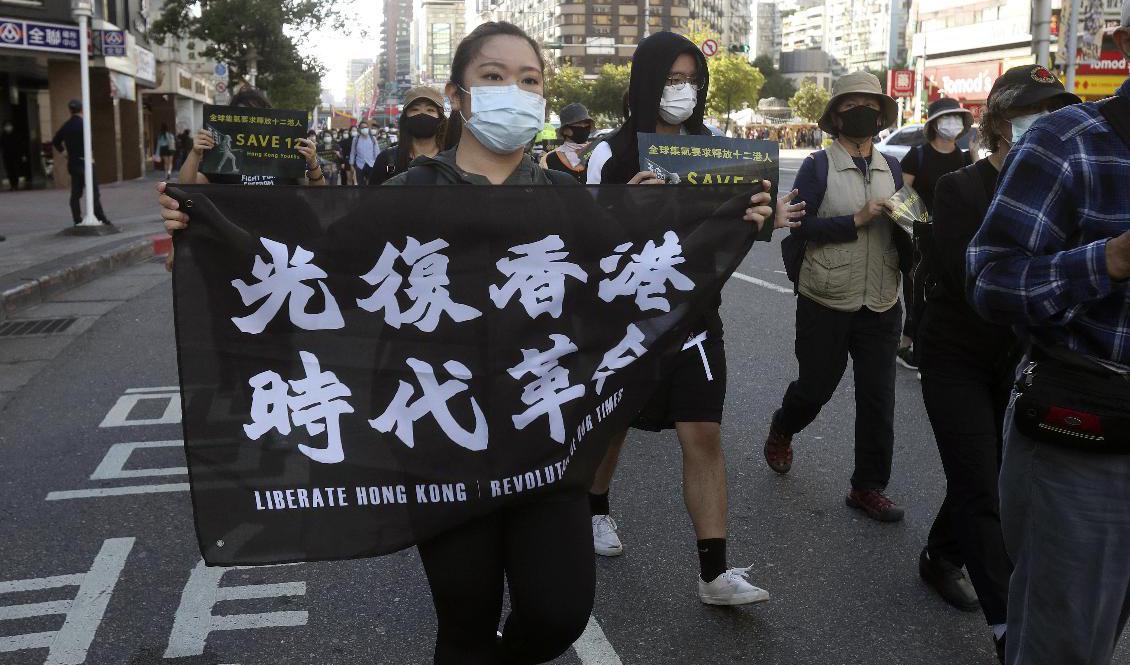 Protester till stöd för Hongkongbor i Taipei, Taiwan i oktober 2020. Foto: Chiang Ying-ying/AP/TT