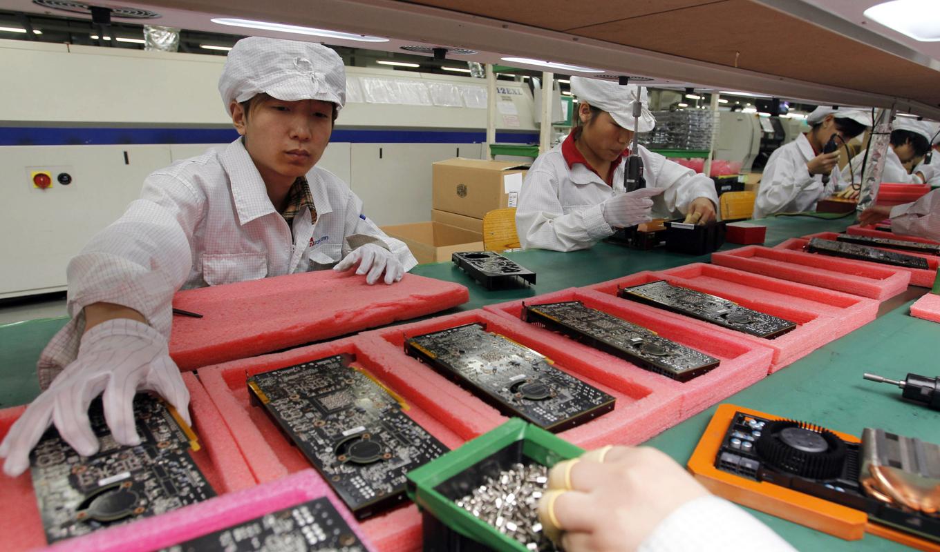 Taiwanesiska Foxconn, som sedan länge är en ledande underleverantör av Iphone-telefoner till Apple, planerar indisk storsatsning. Arkivbild Foto: Kin Cheung AP/TT